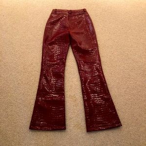 Deep red faux crocodile leather pants by Motel size S. Never worn.